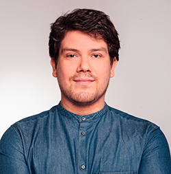 Arthur is a white man with brown hair and brown eyes, in the picture he is shown wearing a blue shirt