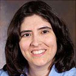 Headshot of Dr. Stephanie Ludi, a Hispanic women with short black hair and brown eyes